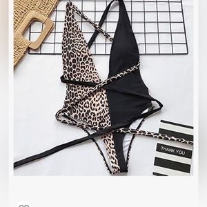 Deep plunge leopard one piece swimsuit